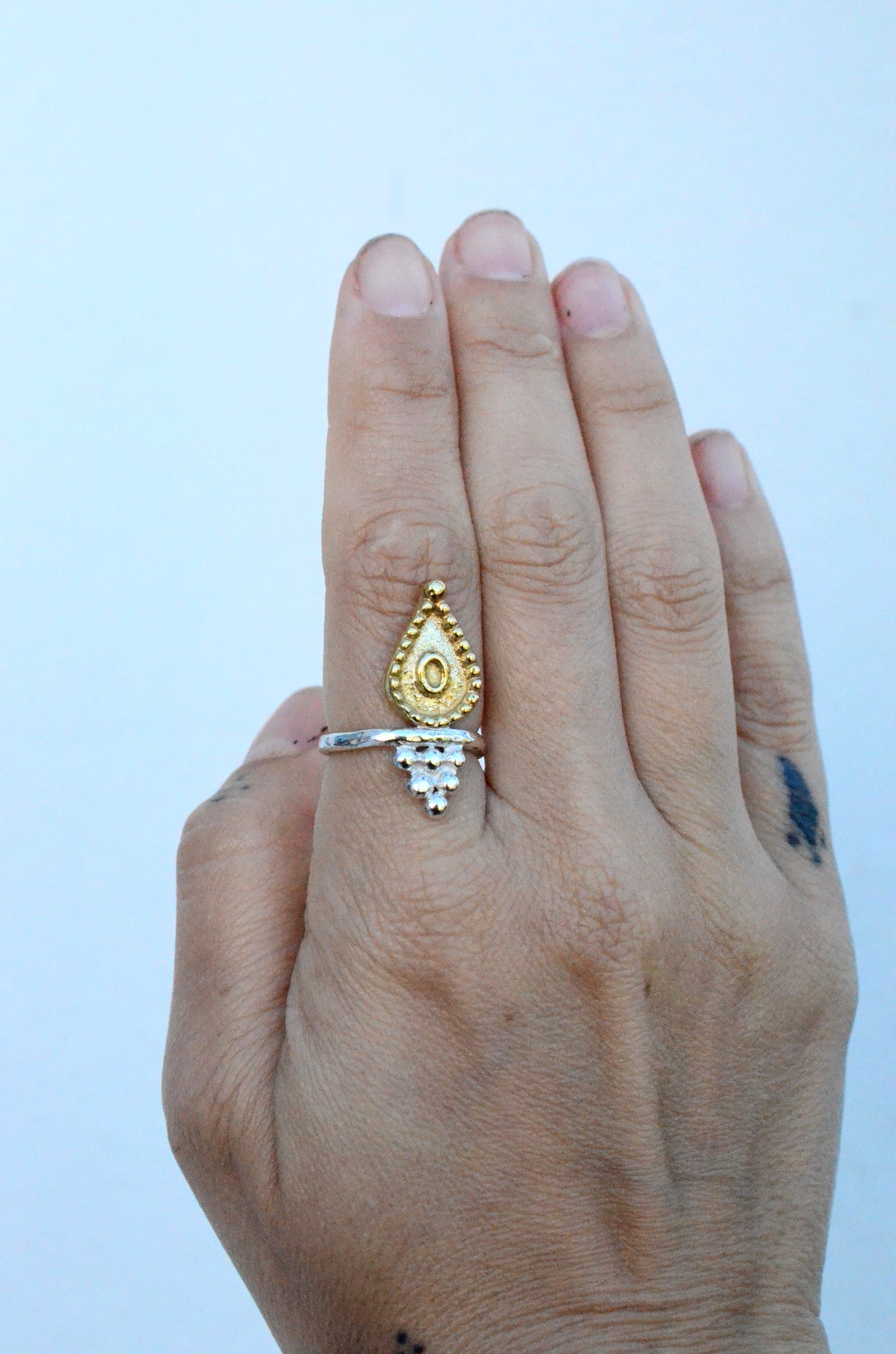 Mixed metal talisman ring