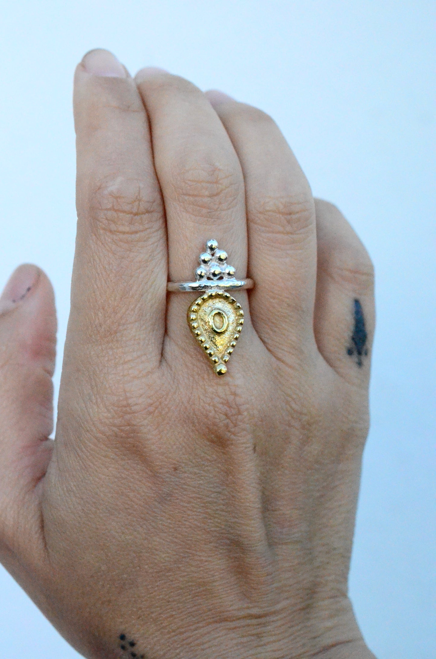 Mixed metal talisman ring